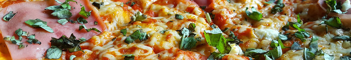 Eating Italian Pizza at Mezza Luna Italian Restaurant restaurant in Manalapan Township, NJ.